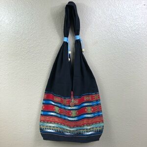 Tibetan cloth bag with wooden button.